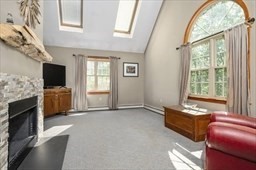 6 Mellen Street Hopedale, MA 01747 - Photo 9 of 42 a living room with furniture fireplace and flat screen tv