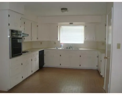 a view of a kitchen with window
