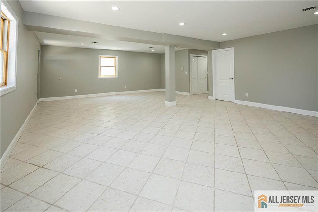 278 Rector Street Perth Amboy, NJ 08861 - Photo 32 of 47 a view of an empty room and window