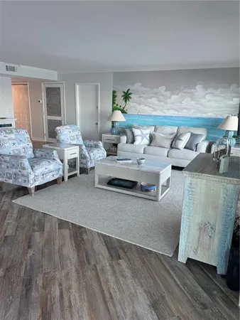 a living room with furniture and a couch