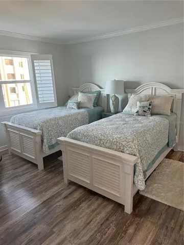 a living room with two couches and view of living room