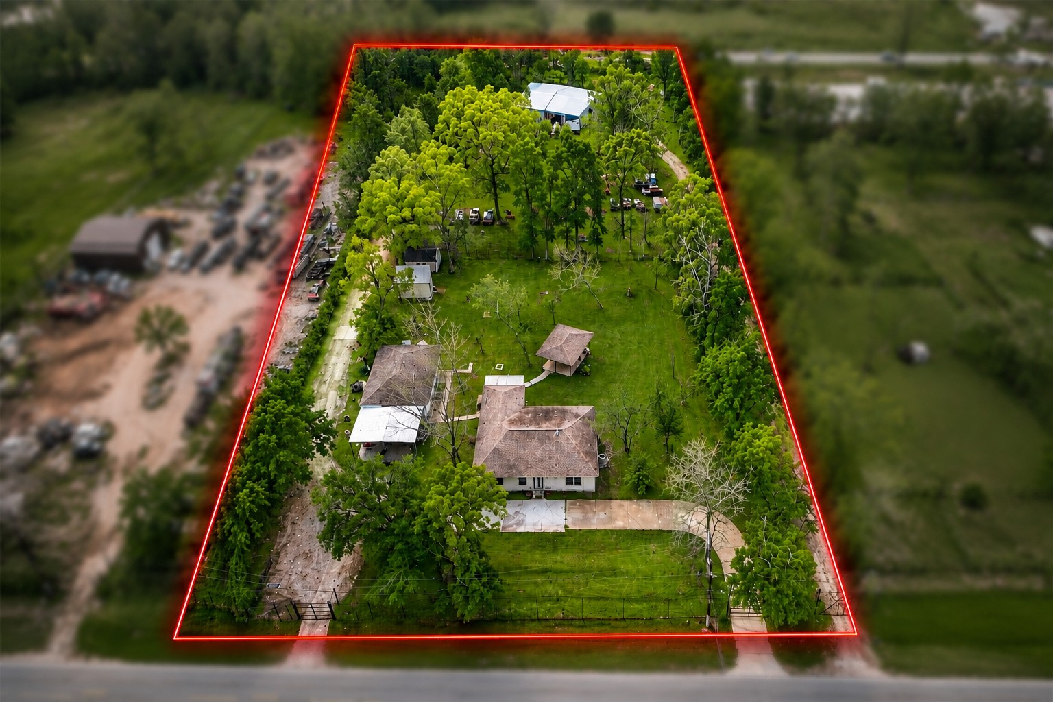 1725 Strawn Road Houston, TX 77039 - Photo 2 of 44 See the opportunity from above, 2.3 acres connecting residential, income, storage and workspace possibilities.
