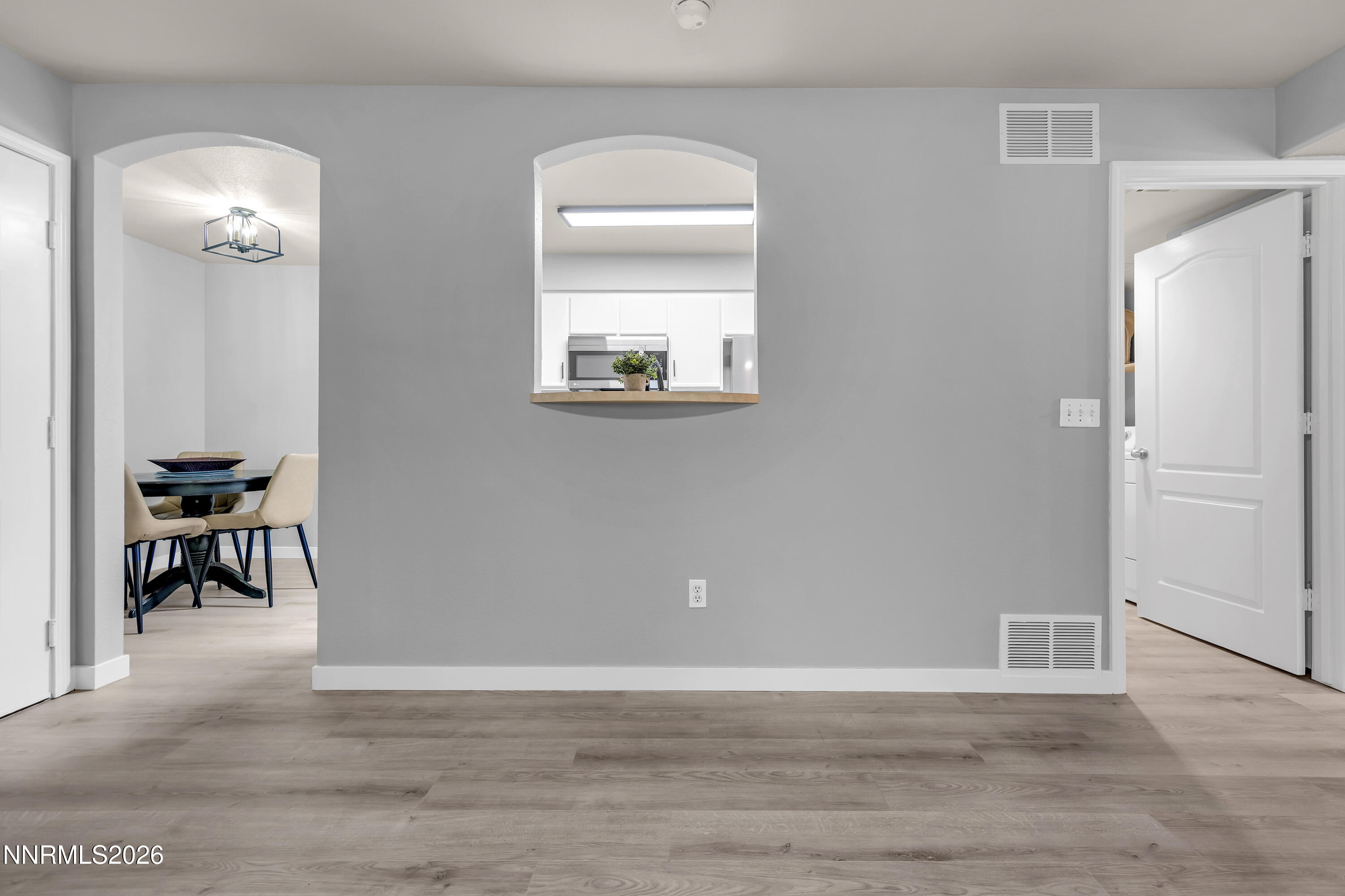 6850 Sharlands Avenue, Unit E 2022 Reno, NV 89523 - Photo 10 of 19 a view of livingroom with hardwood floor