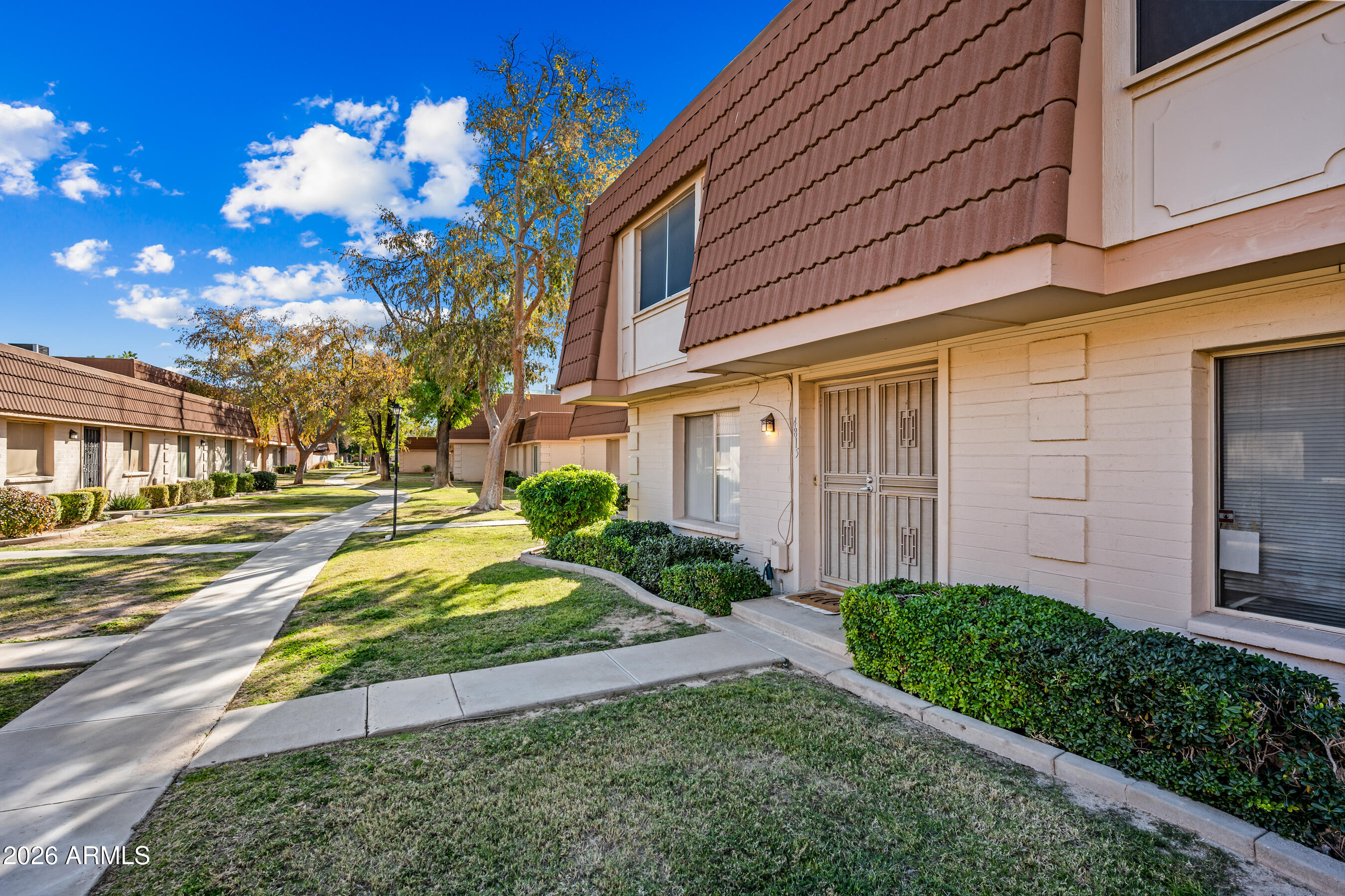 4815 South Birch Street Tempe, AZ 85282 - Photo 2 of 25 a view of a house with a yard