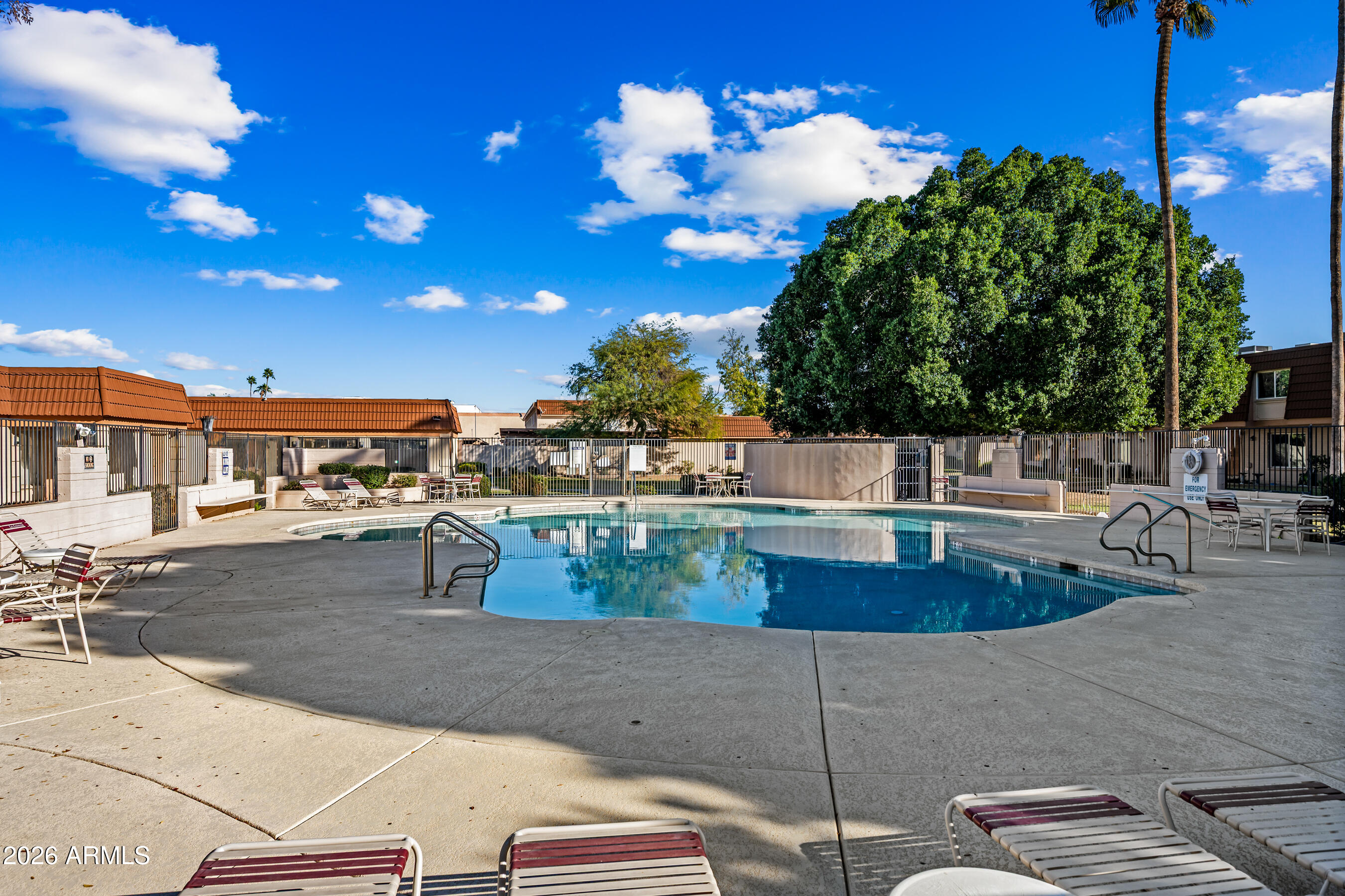 4815 South Birch Street Tempe, AZ 85282 - Photo 23 of 25 a view of a swimming pool with a patio