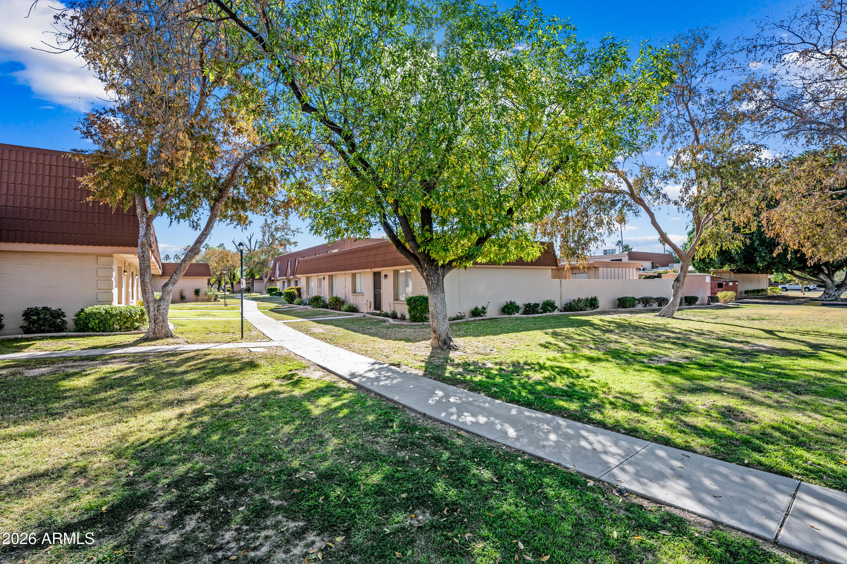 4815 South Birch Street Tempe, AZ 85282 - Photo 25 of 25 a view of a house with pool and a yard