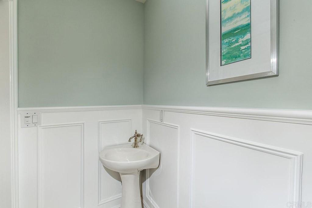 768 Devonshire Drive Encinitas, CA 92024 - Photo 16 of 30 a bathroom with a sink and mirror