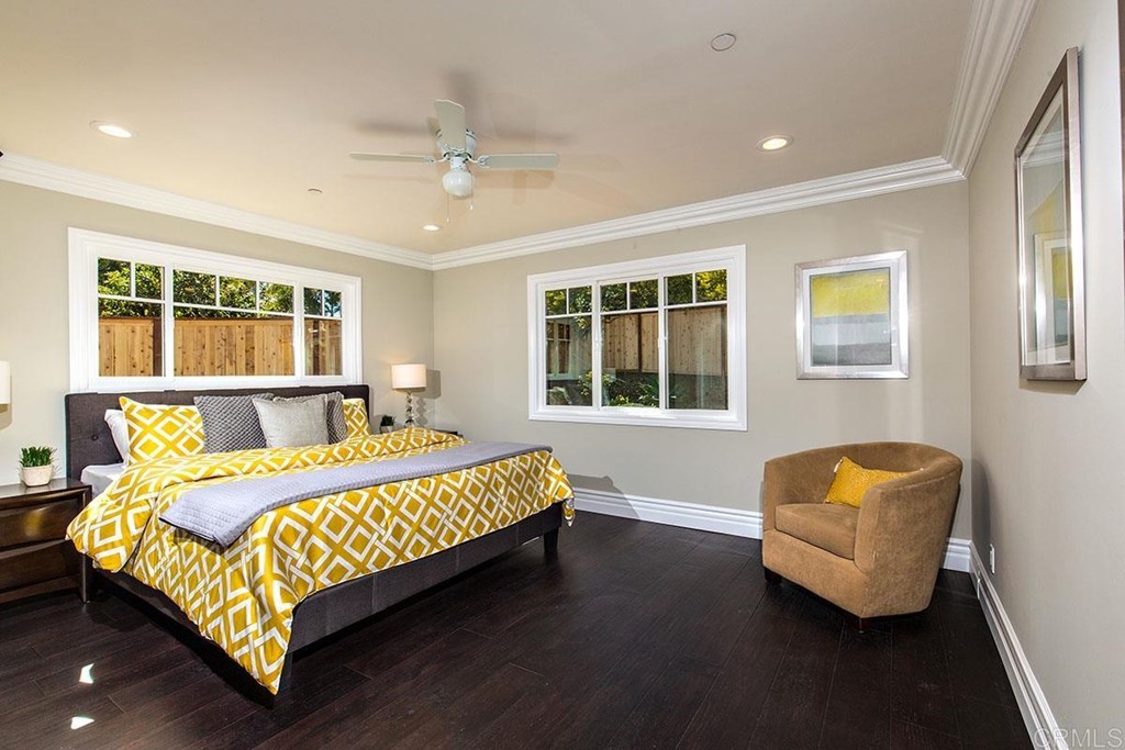 768 Devonshire Drive Encinitas, CA 92024 - Photo 17 of 30 a bedroom with a bed and window