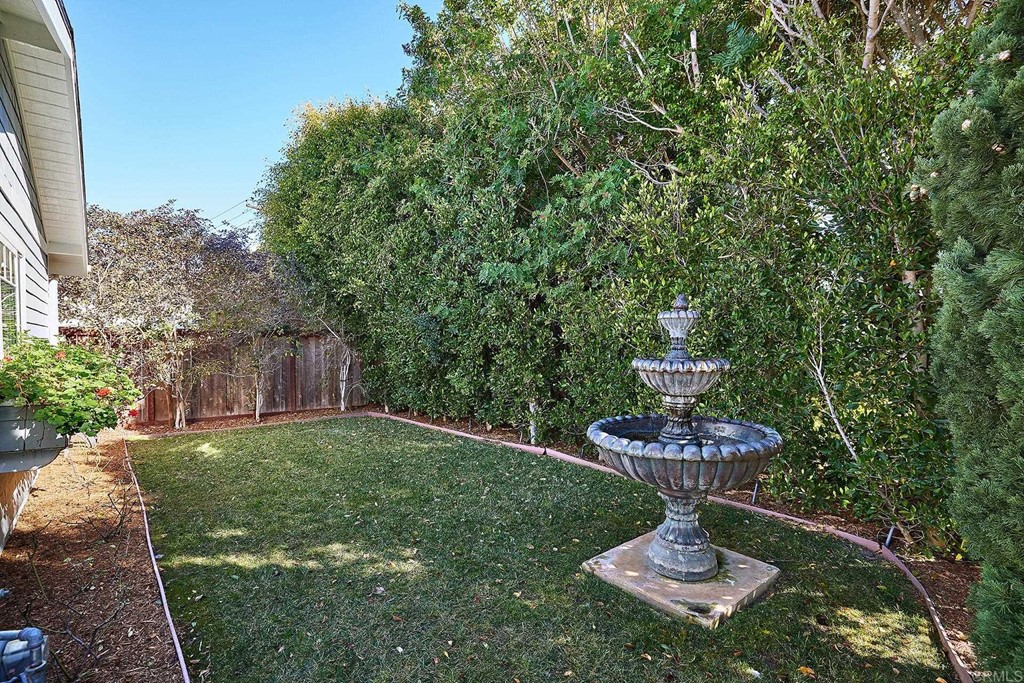 768 Devonshire Drive Encinitas, CA 92024 - Photo 22 of 30 a view of a fountain in a yard with plants
