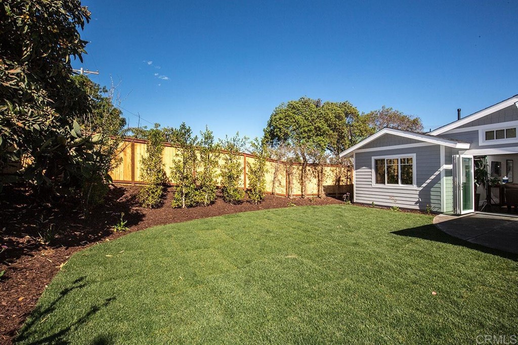 768 Devonshire Drive Encinitas, CA 92024 - Photo 28 of 30 a front view of a house with a garden