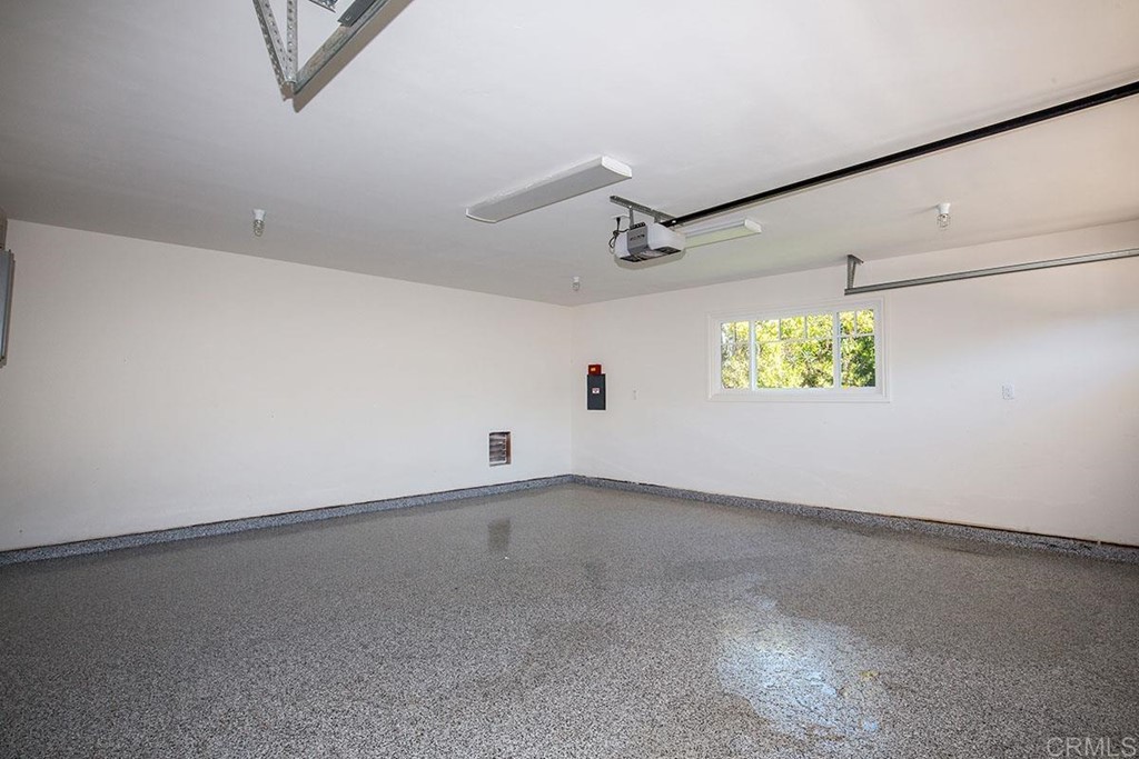 768 Devonshire Drive Encinitas, CA 92024 - Photo 30 of 30 an empty room with windows and fan