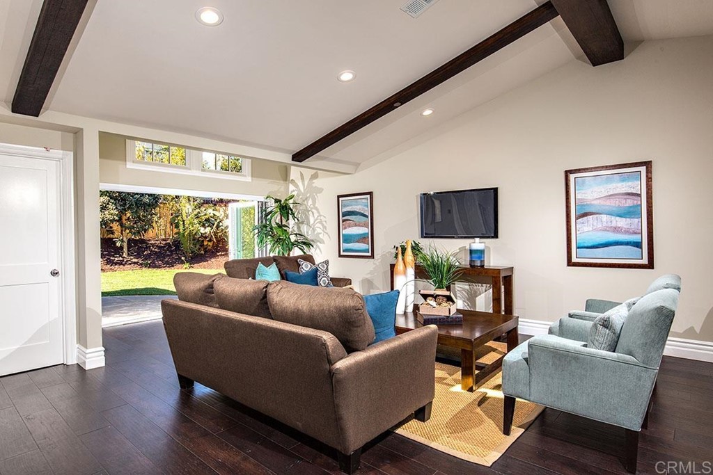 768 Devonshire Drive Encinitas, CA 92024 - Photo 9 of 30 a living room with furniture and a large window