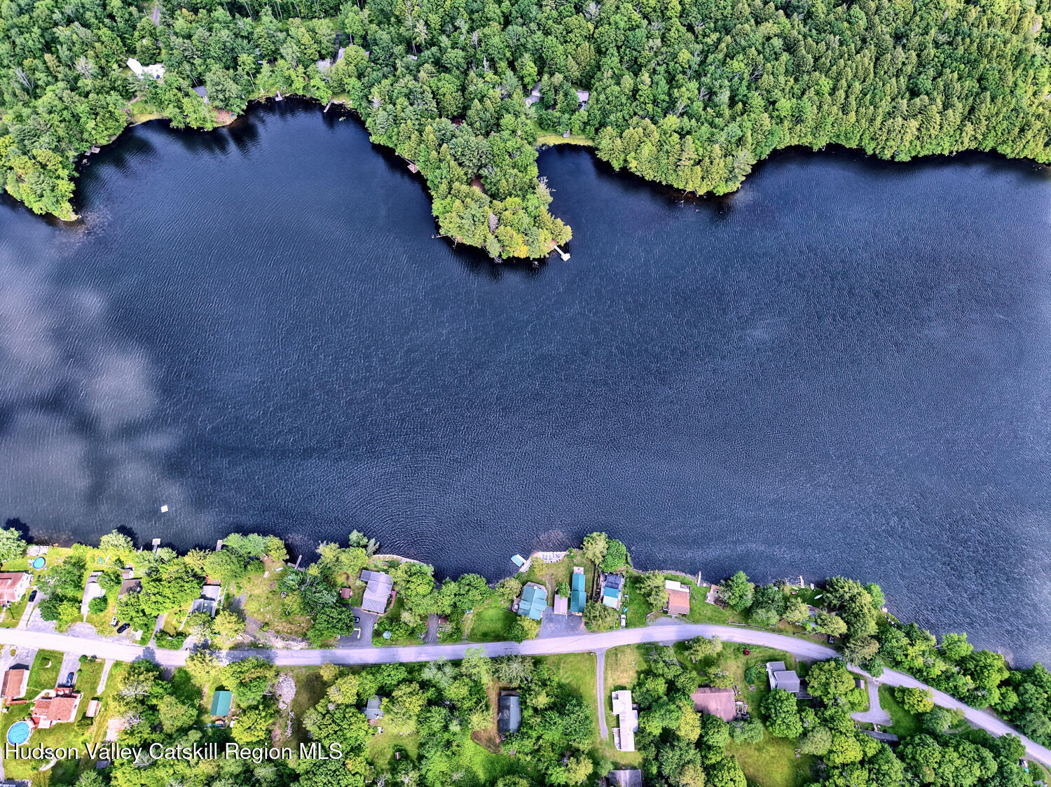 145 Lake Road Berne, NY 12023 - Photo 20 of 66 a wooden fence with some plants