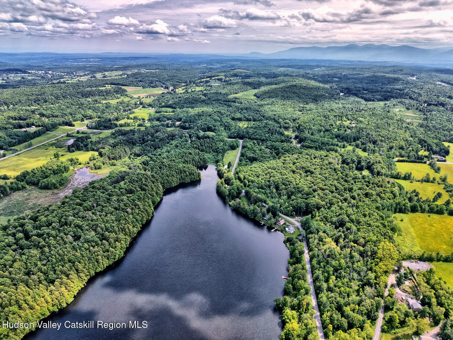 145 Lake Road Berne, NY 12023 - Photo 23 of 66 a view of a garden with an ocean beach