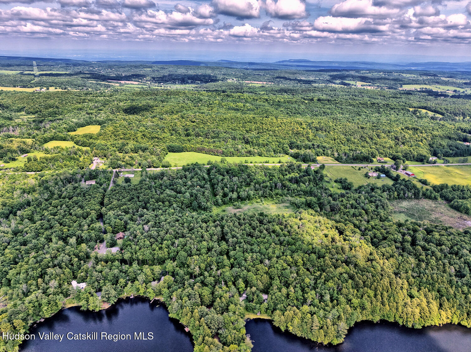 145 Lake Road Berne, NY 12023 - Photo 24 of 66 a view of a yard with an outdoor seating
