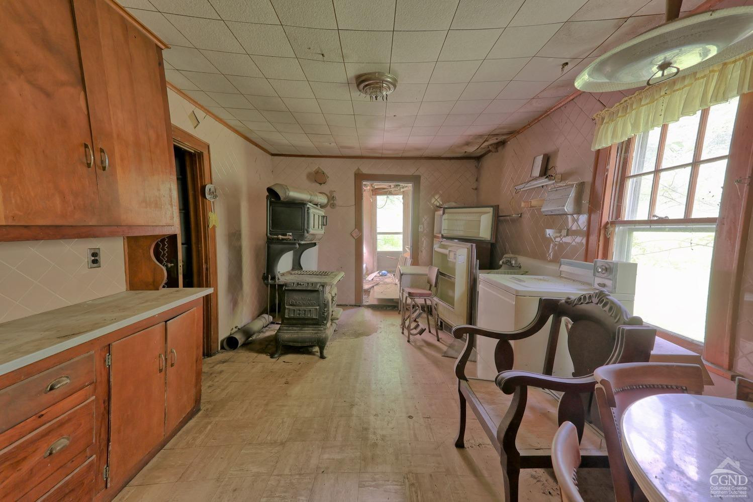 145 Lake Road Berne, NY 12023 - Photo 35 of 66 a view of a kitchen with furniture and windows