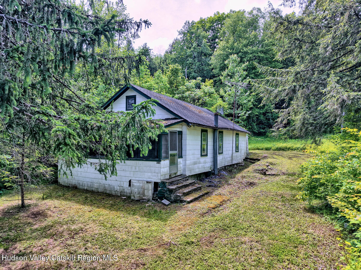 145 Lake Road Berne, NY 12023 - Photo 54 of 66 a view of a house with a yard
