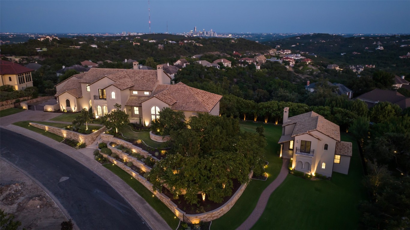 5931 Bold Ruler Way Austin, TX 78746 - Photo 1 of 1 an aerial view of residential houses with outdoor space and trees