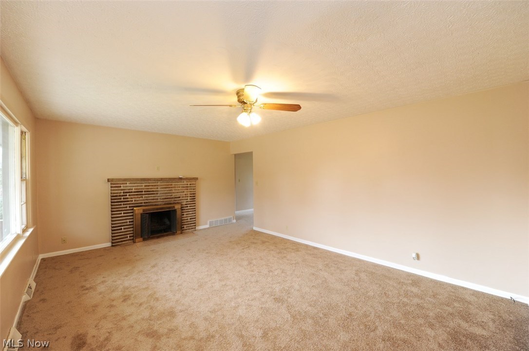 5660 Dailey Road New Franklin, OH 44319 - Photo 7 of 23 Living Room W/Brick Woodburning Real Fireplace!
