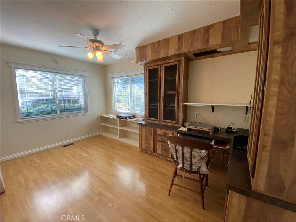9607 Rosedale Drive Calimesa, CA 92320 - Photo 13 of 27 a view of a workspace with furniture and a window