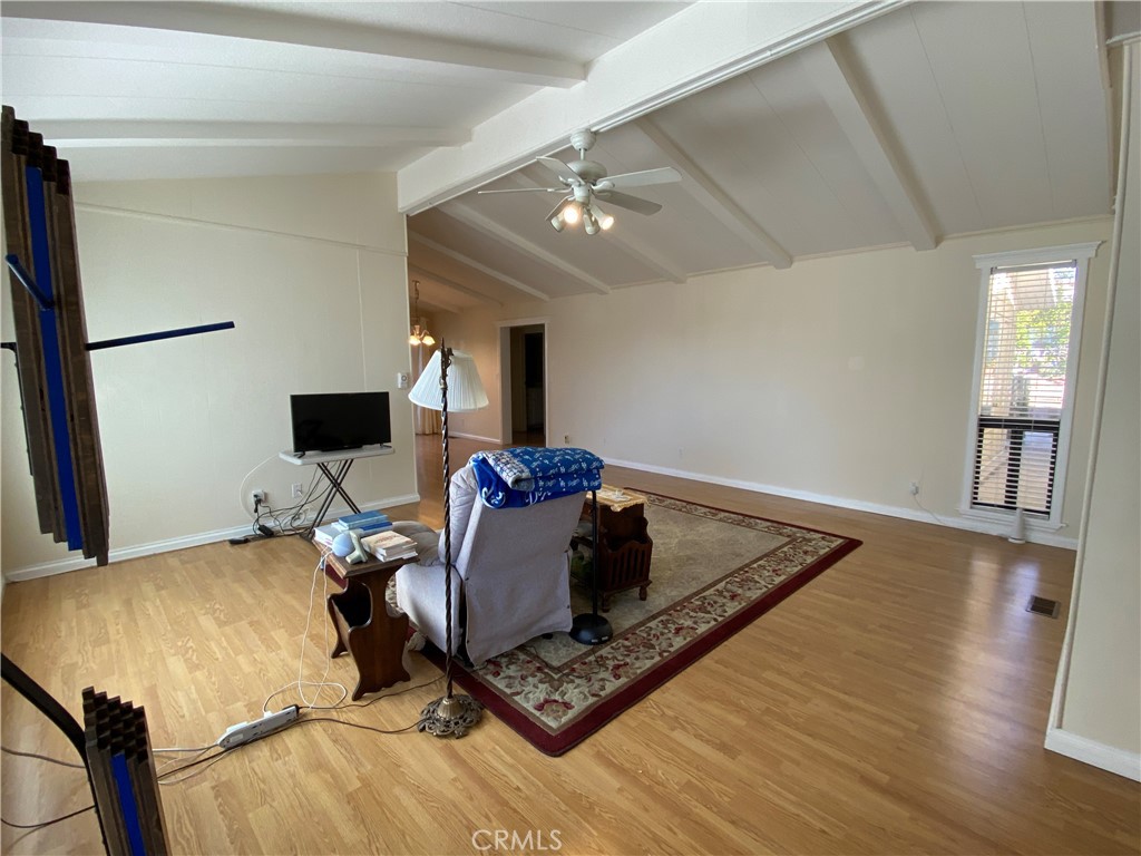 9607 Rosedale Drive Calimesa, CA 92320 - Photo 6 of 27 a bed room with a bed window and a chair