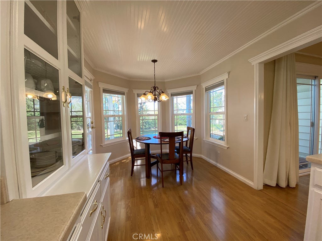 9607 Rosedale Drive Calimesa, CA 92320 - Photo 10 of 27 a view of a dining room with furniture and window
