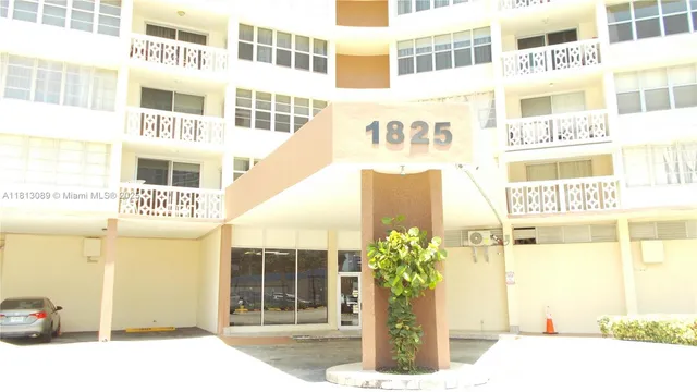 a front view of a building with a entrance