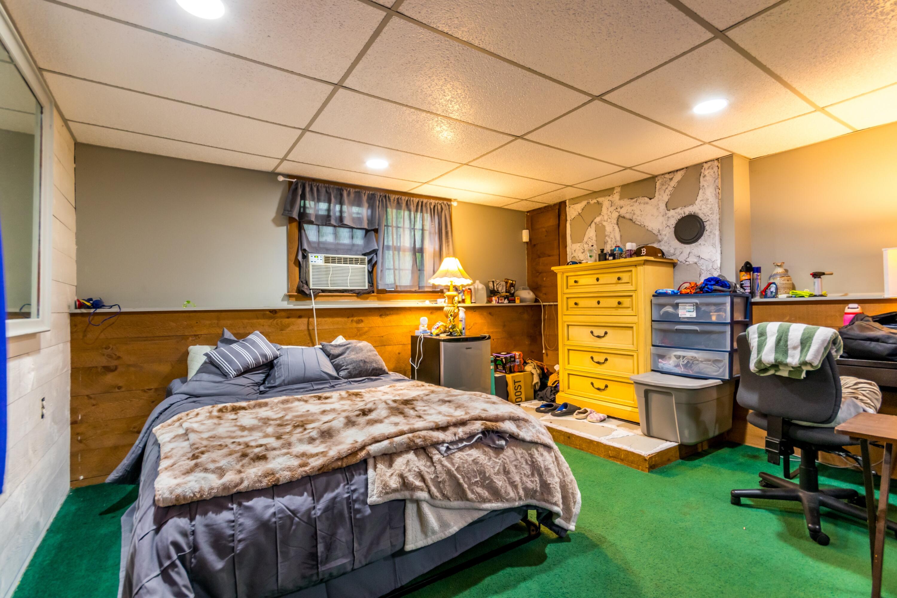 66 Braxton Road East Falmouth, MA 02536 - Photo 14 of 17 a bedroom with a bed and chair