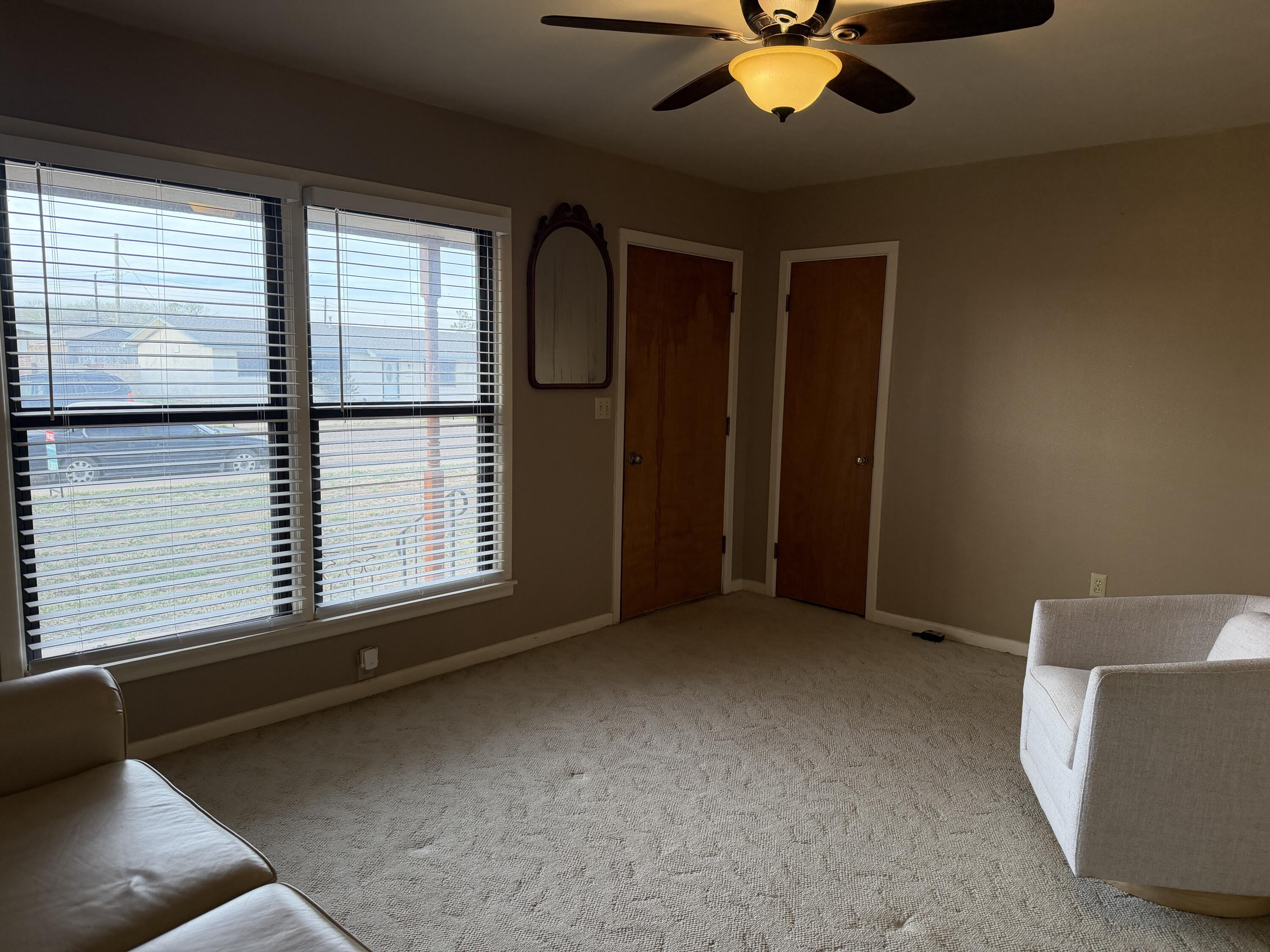 303 North 21st Place Lamesa, TX 79331 - Photo 4 of 35 a view of livingroom with window