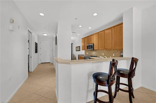 $399,999 | 4884 Hampshire Court, Unit 7303, Naples, FL 34112