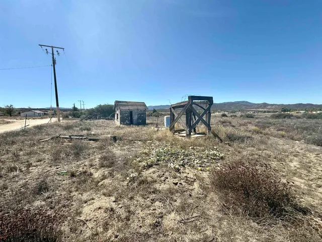 a view of a large body of water with a mountain in the background