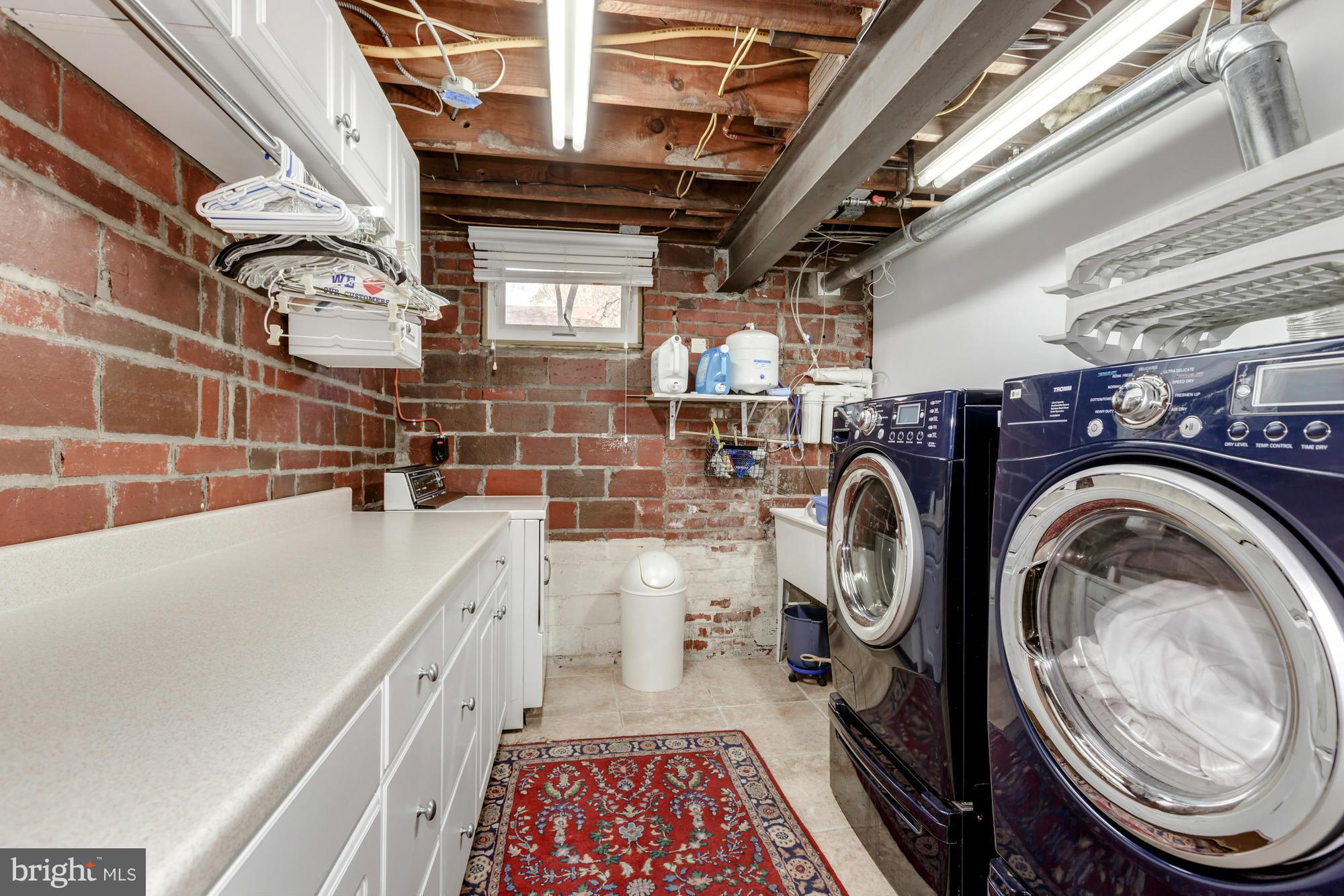 3921 Military Road Northwest Washington, DC 20015 - Photo 26 of 30 Laundry Room with sink/cabinets