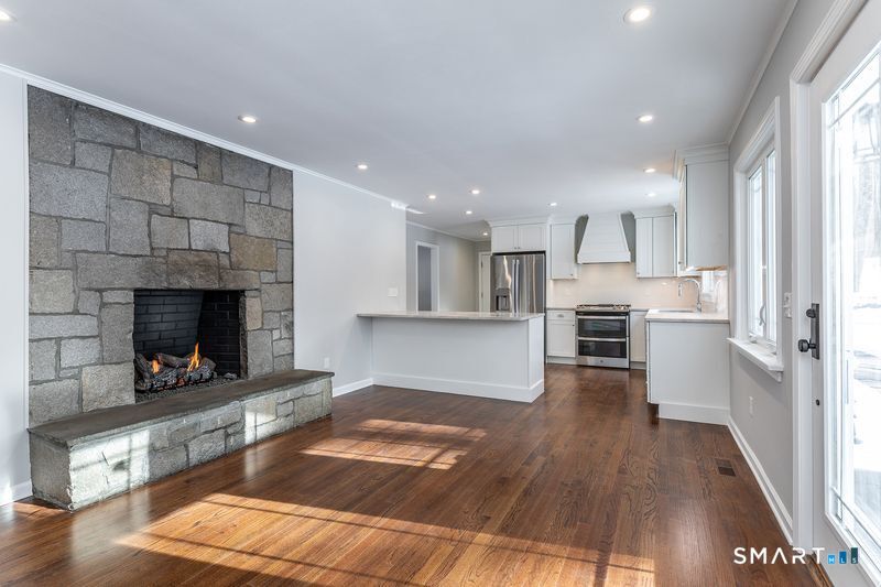 102 Wykeham Road Washington, CT 06793 - Photo 9 of 24 Propane fireplace and eat-in area in Kitchen.