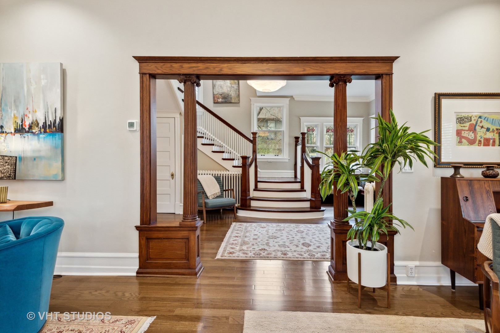 1224 Maple Avenue Evanston, IL 60202 - Photo 14 of 71 a view of an entryway with wooden floor and a potted plant