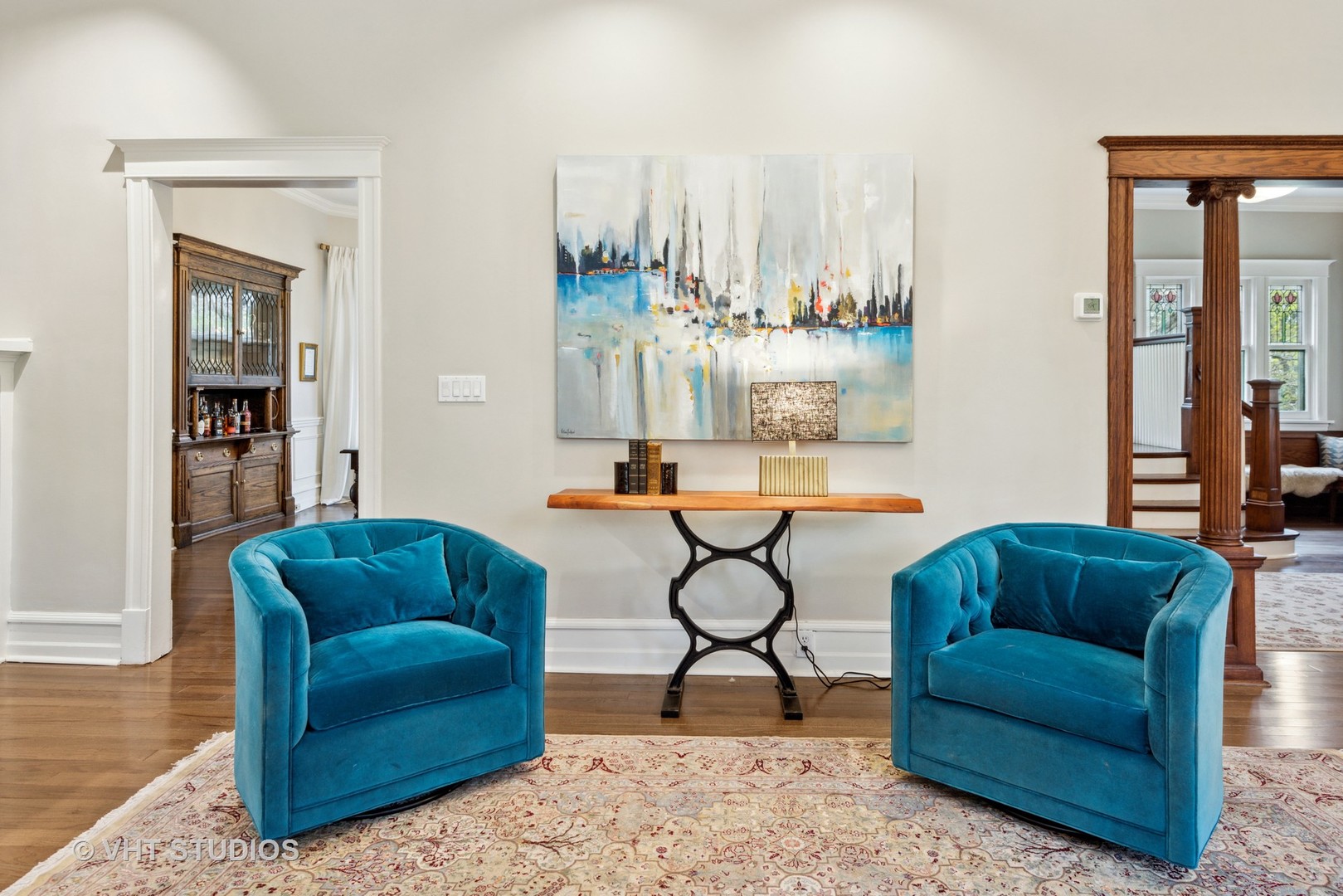 1224 Maple Avenue Evanston, IL 60202 - Photo 22 of 71 a living room with furniture and a chandelier