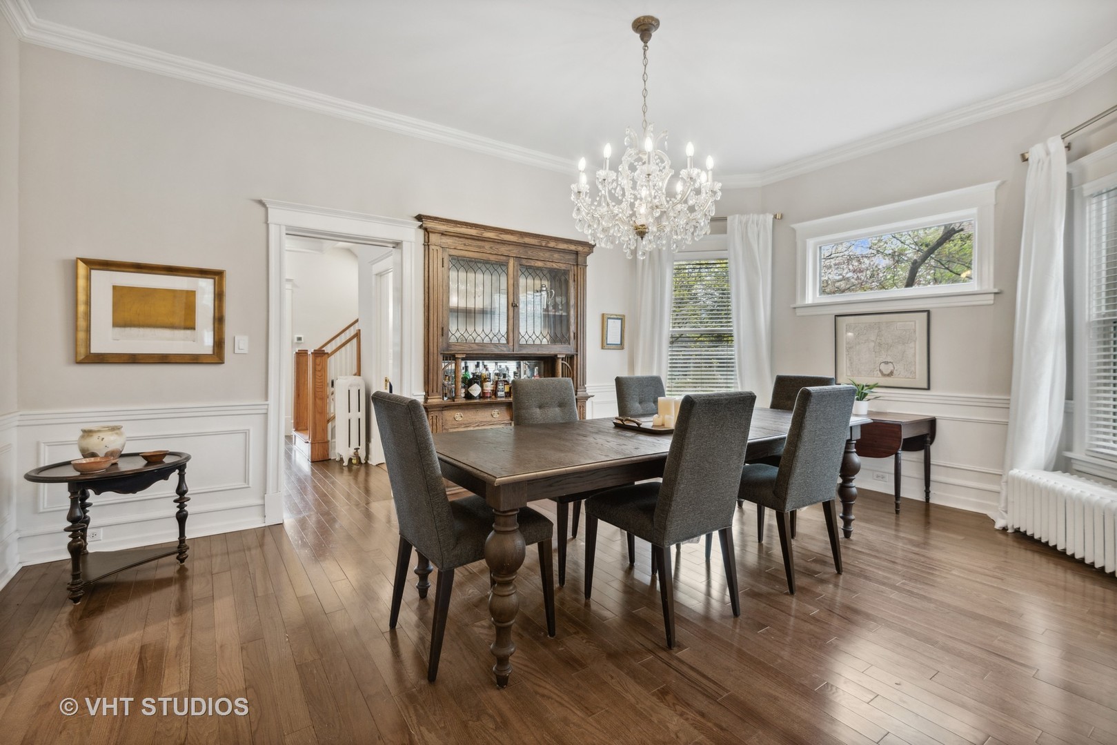 1224 Maple Avenue Evanston, IL 60202 - Photo 24 of 71 a view of a dining room with furniture wooden floor and chandelier
