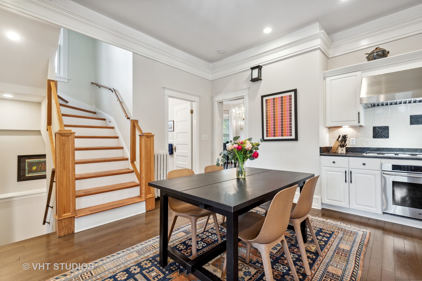 1224 Maple Avenue Evanston, IL 60202 - Photo 27 of 71 a view of a dining room with furniture and wooden floor