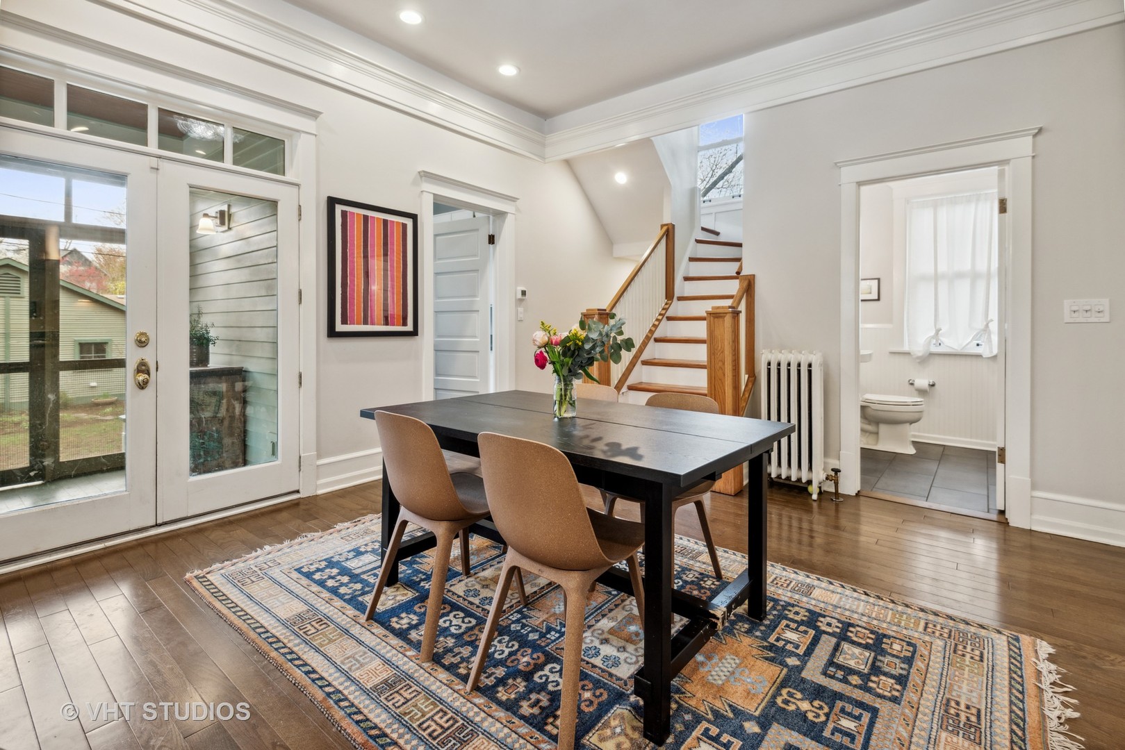 1224 Maple Avenue Evanston, IL 60202 - Photo 33 of 71 a view of a dining room with furniture and wooden floor