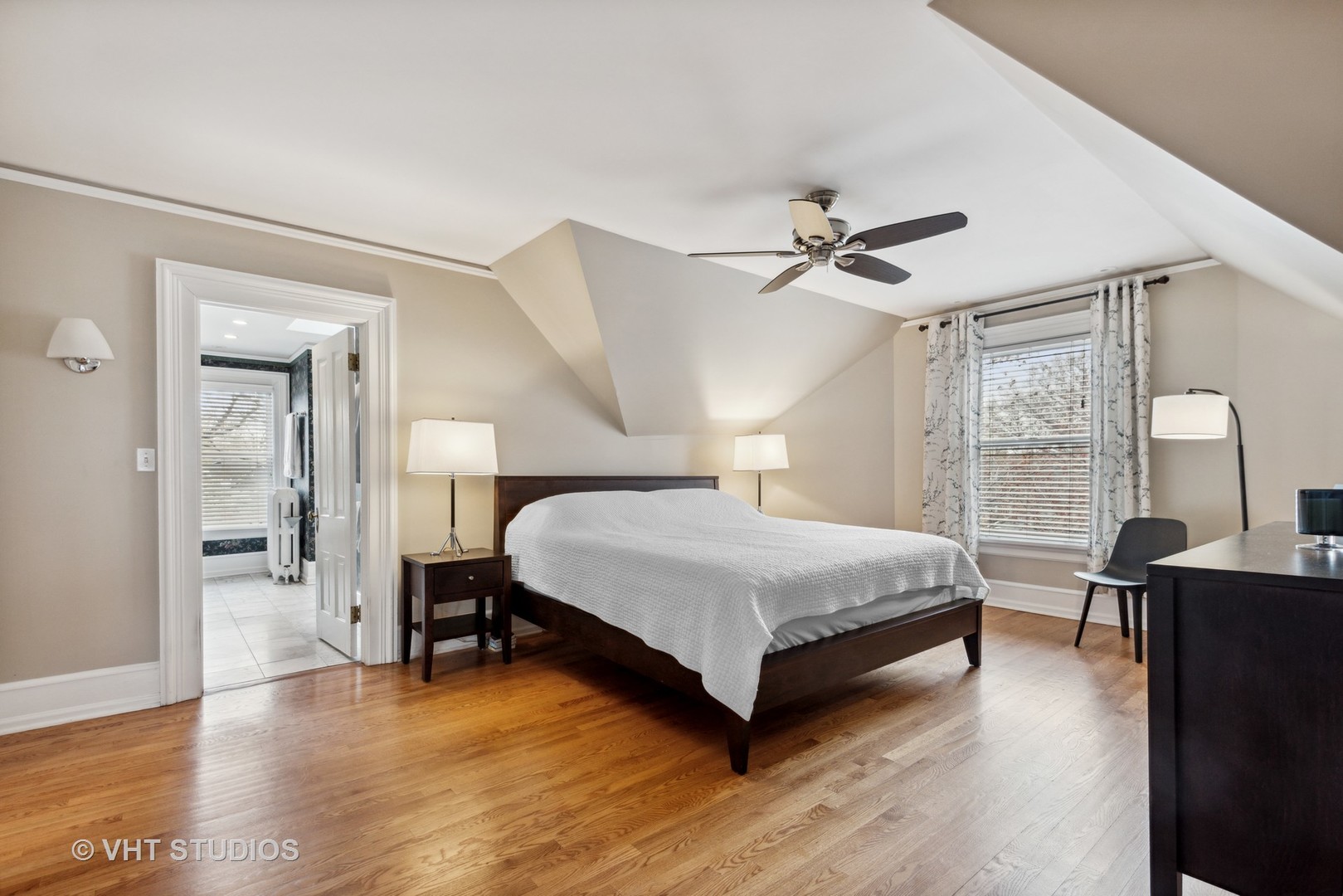1224 Maple Avenue Evanston, IL 60202 - Photo 37 of 71 a bedroom with a bed and wooden floor