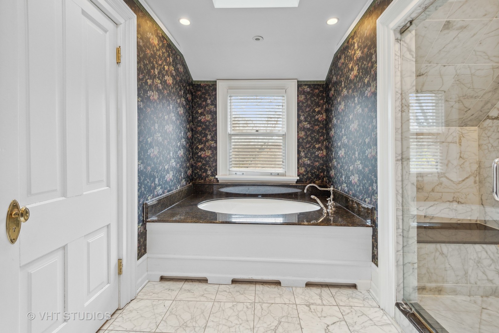 1224 Maple Avenue Evanston, IL 60202 - Photo 39 of 71 a bathroom with a sink and a mirror