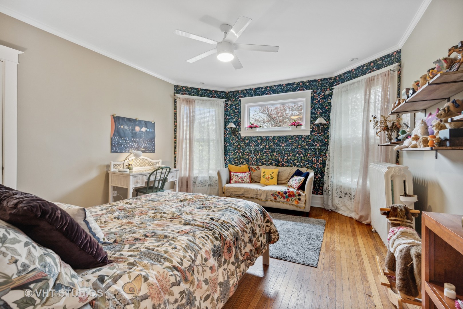 1224 Maple Avenue Evanston, IL 60202 - Photo 53 of 71 a bedroom with a bed and wooden floor