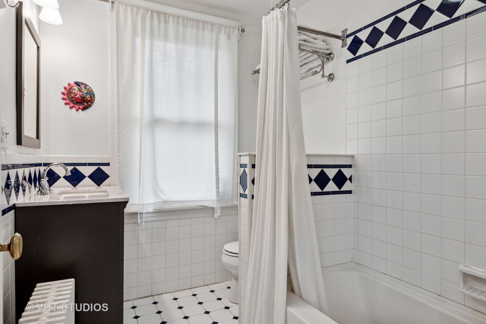 1224 Maple Avenue Evanston, IL 60202 - Photo 56 of 71 a bathroom with a bathtub and shower