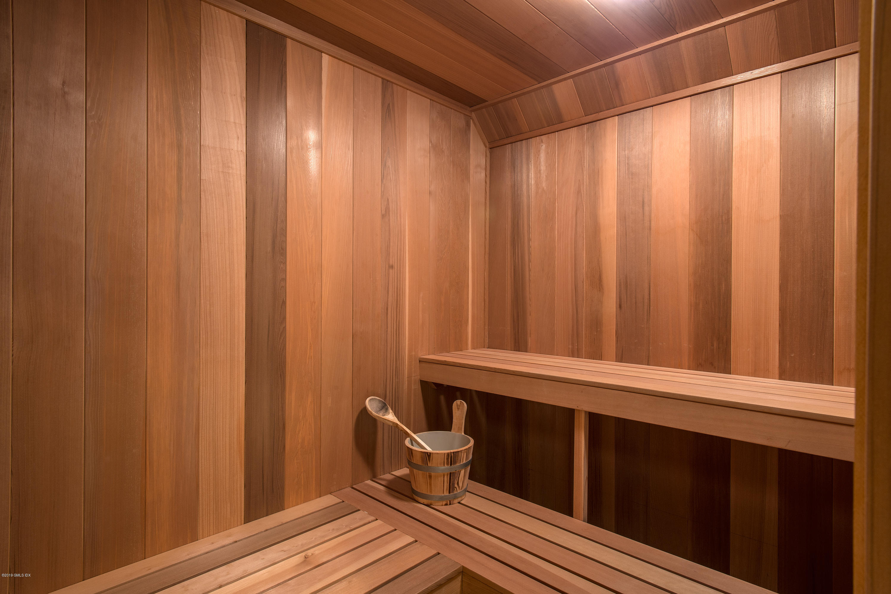 56 North Stanwich Road Greenwich, CT 06831 - Photo 20 of 30 a bathroom with a sink and a toilet