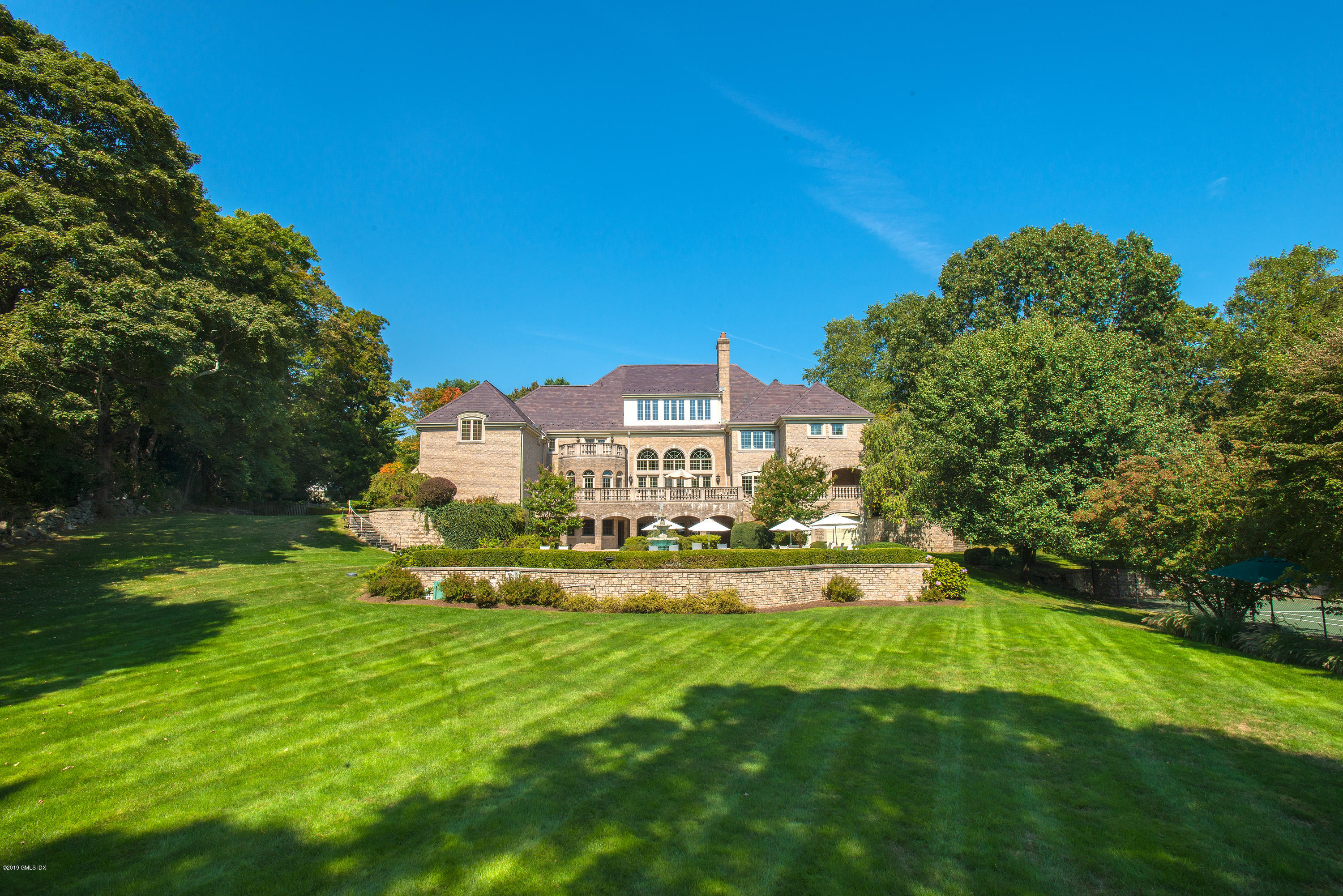 56 North Stanwich Road Greenwich, CT 06831 - Photo 30 of 30 a view of a house with a big yard