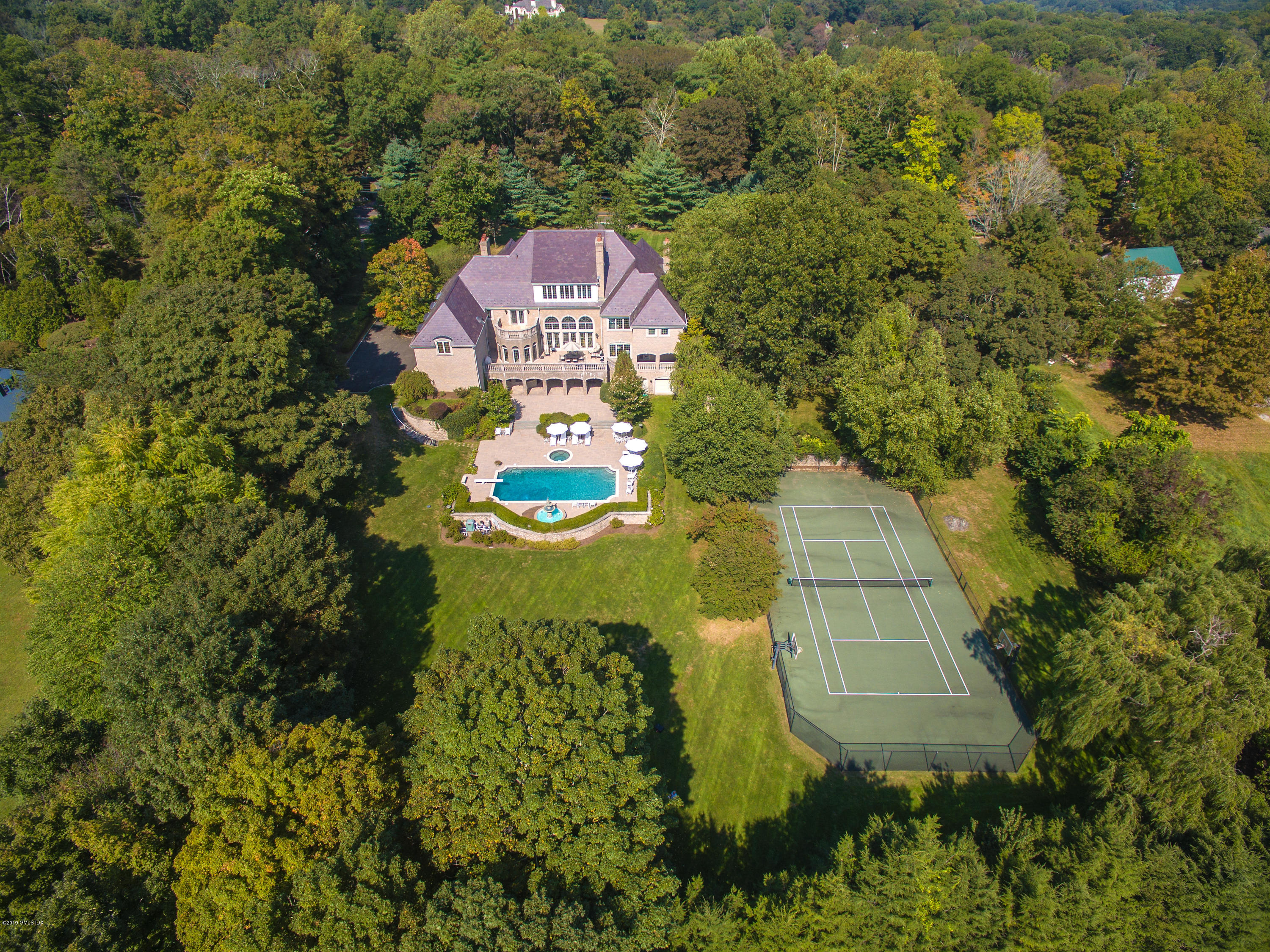 56 North Stanwich Road Greenwich, CT 06831 - Photo 3 of 30 an aerial view of a house with a garden