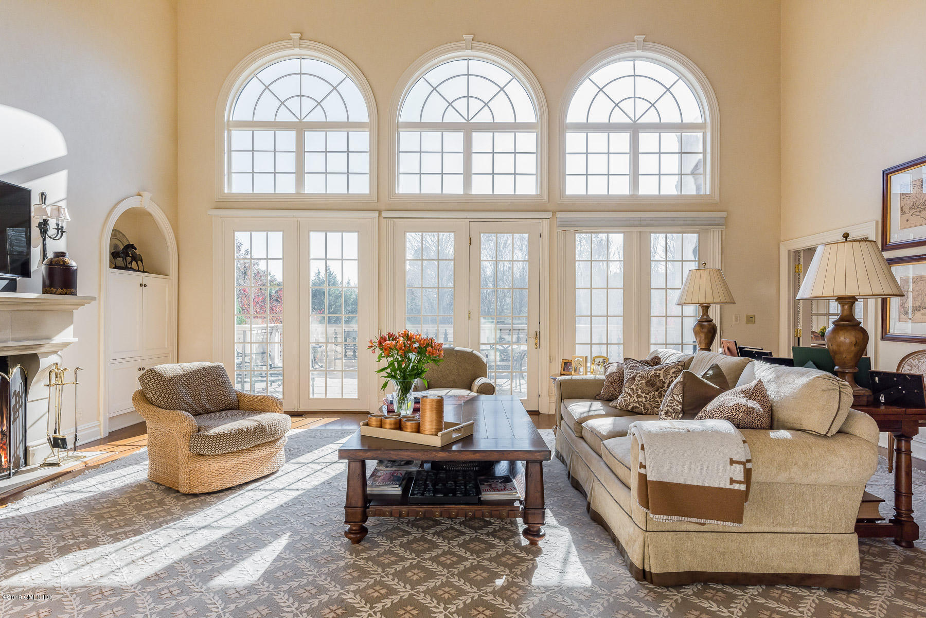 56 North Stanwich Road Greenwich, CT 06831 - Photo 7 of 30 a living room with furniture fireplace and a large window