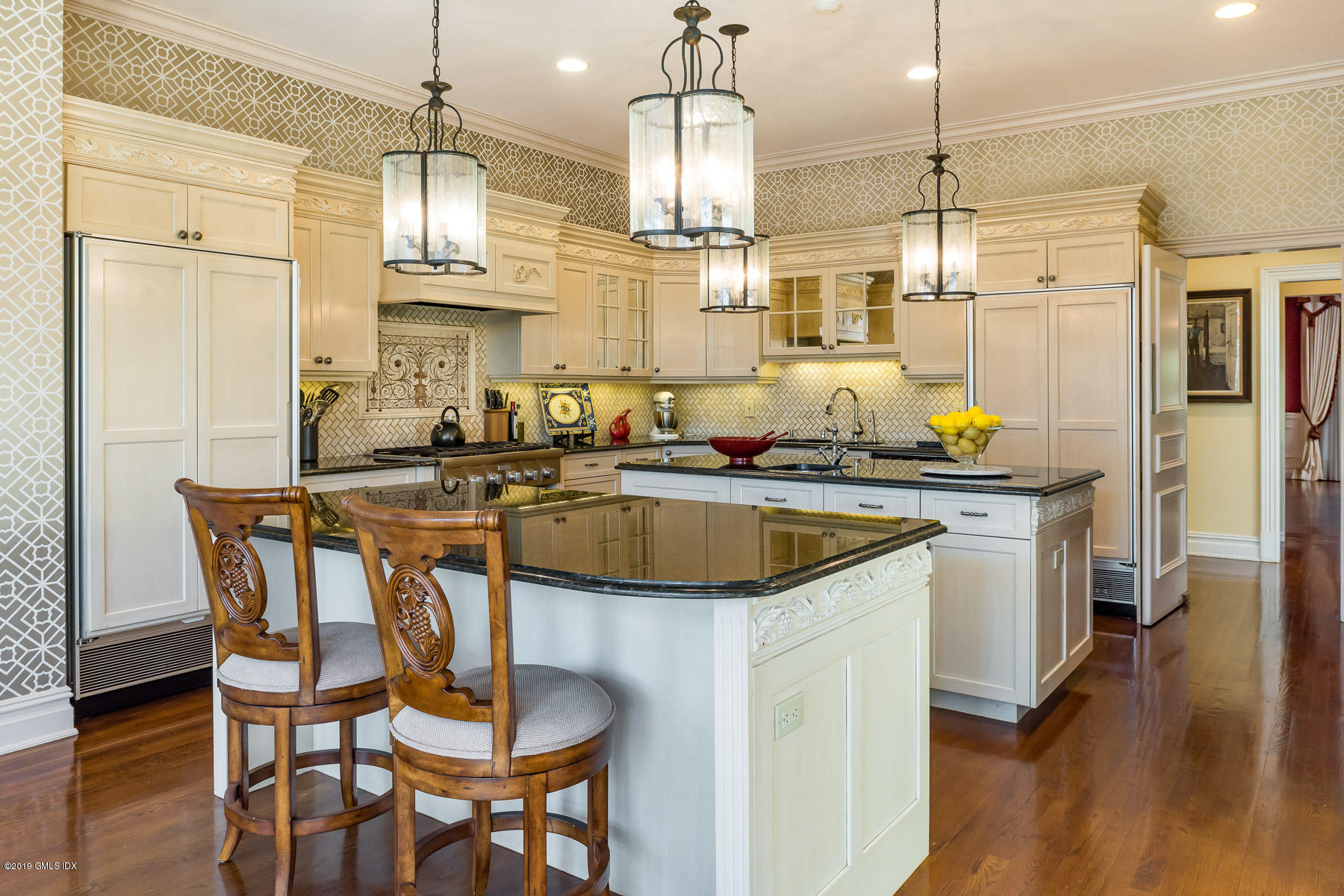 56 North Stanwich Road Greenwich, CT 06831 - Photo 8 of 30 a kitchen with stainless steel appliances granite countertop a sink a stove and a wooden floors