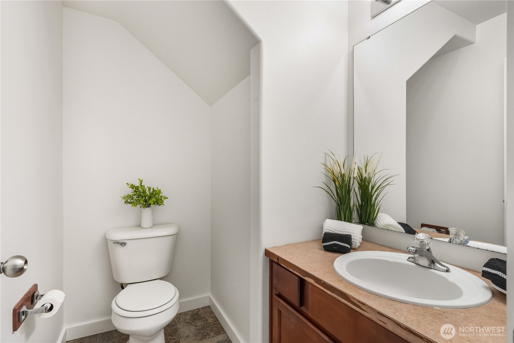 18312 8th Avenue Southeast Bothell, WA 98012 - Photo 13 of 39 a bathroom with a sink toilet and a mirror