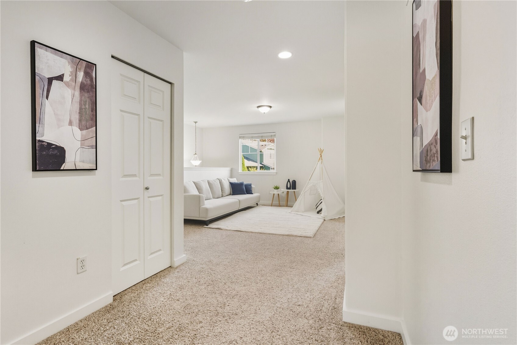 18312 8th Avenue Southeast Bothell, WA 98012 - Photo 17 of 39 a spacious bedroom with a bed and a couch