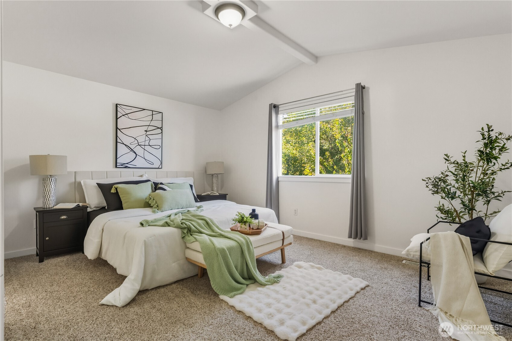 18312 8th Avenue Southeast Bothell, WA 98012 - Photo 18 of 39 a bed room with a bed and a chair